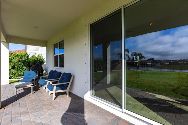13422 Flat Woods Ter, Bradenton, FL 34211 - view of patio / terrace with a water view and a grill