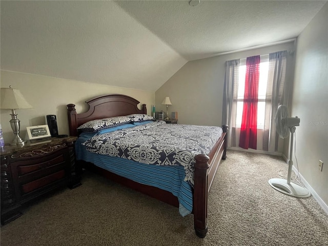 bedroom with a textured ceiling, vaulted ceiling, baseboards, and carpet