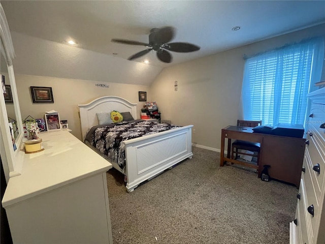 bedroom featuring carpet, ceiling fan, and vaulted ceiling