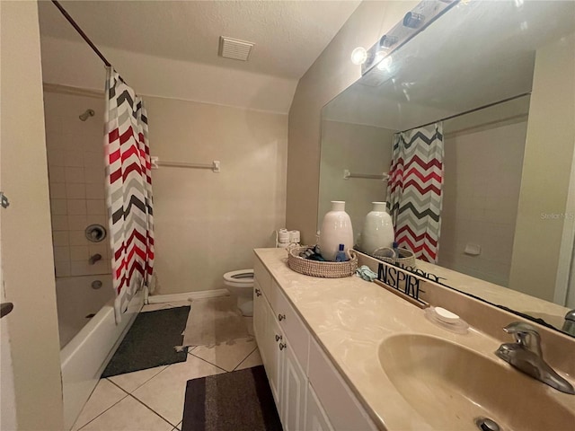 bathroom featuring visible vents, vanity, shower / bath combination with curtain, toilet, and tile patterned floors