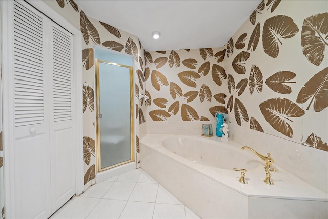 full bath with wallpapered walls, a stall shower, a whirlpool tub, a closet, and tile patterned flooring