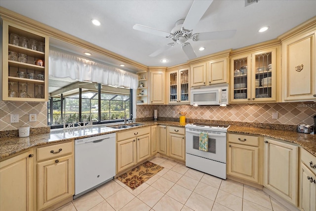 kitchen with white appliances, open shelves, a sink, ceiling fan, and tasteful backsplash