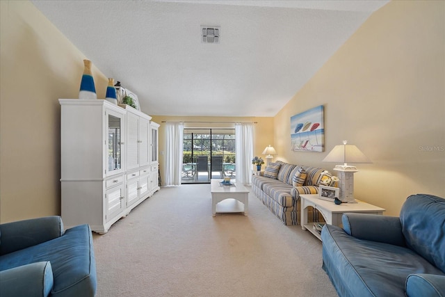 living room featuring light carpet