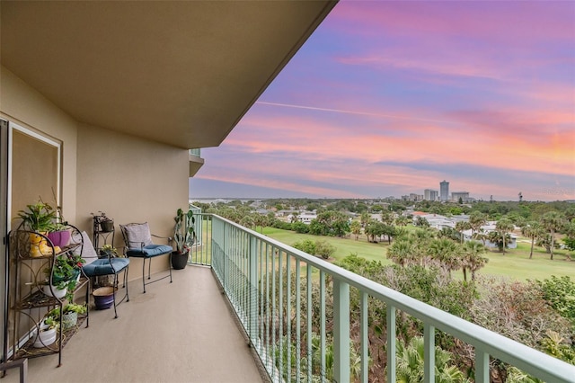 view of balcony at dusk