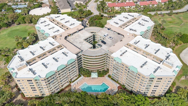 aerial view of a pool area and a golf course