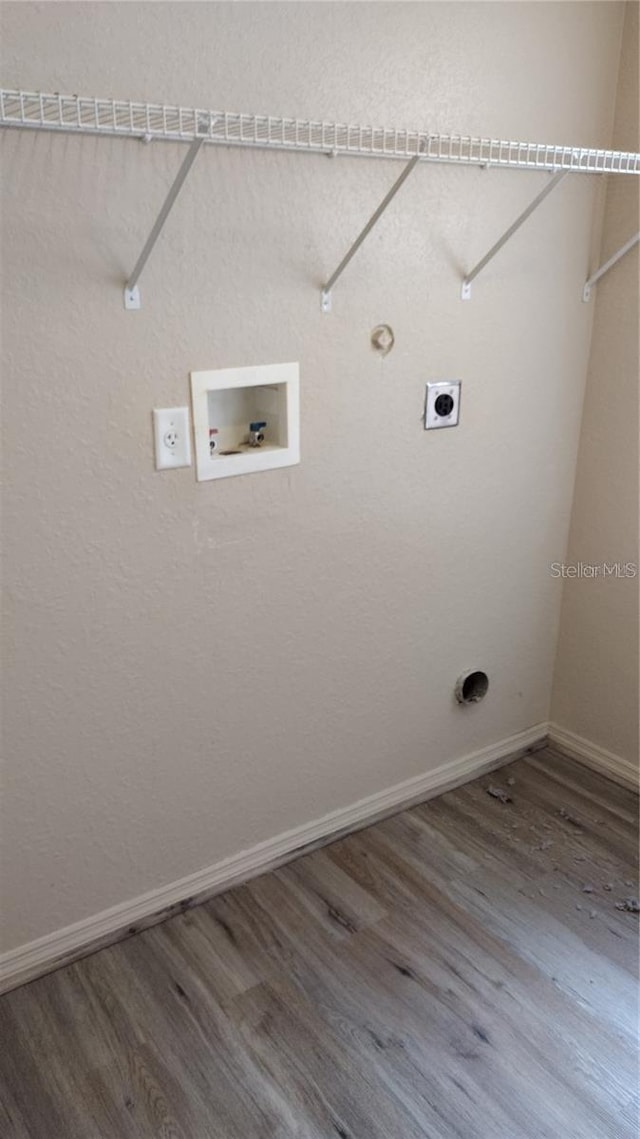 washroom with wood finished floors, laundry area, electric dryer hookup, baseboards, and hookup for a washing machine