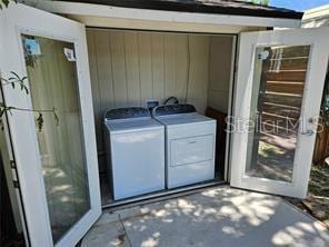 laundry area featuring laundry area and washer and clothes dryer
