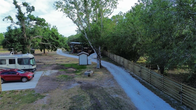 view of road featuring driveway