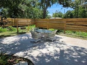 view of patio / terrace with fence and outdoor dining space