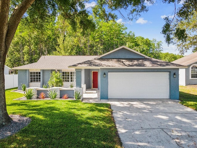 8304 Fishhawk Ave, New Port Richey, FL 34653 - ranch-style house featuring an attached garage, a front lawn, and stucco siding