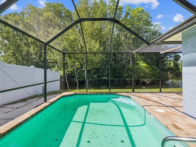 8304 Fishhawk Ave, New Port Richey, FL 34653 - view of pool featuring a fenced backyard, a fenced in pool, and glass enclosure