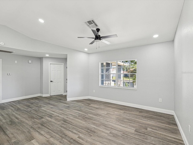 8304 Fishhawk Ave, New Port Richey, FL 34653 - empty room featuring visible vents, recessed lighting, a ceiling fan, and wood finished floors