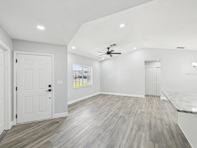 8304 Fishhawk Ave, New Port Richey, FL 34653 - unfurnished living room featuring recessed lighting, ceiling fan, light wood finished floors, and visible vents