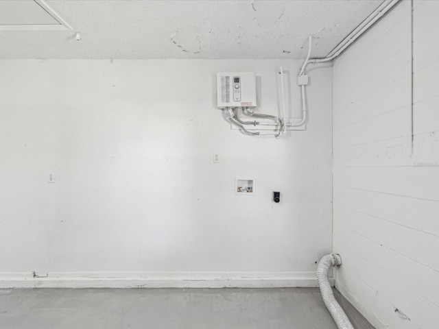 8304 Fishhawk Ave, New Port Richey, FL 34653 - washroom with electric dryer hookup, washer hookup, and baseboards