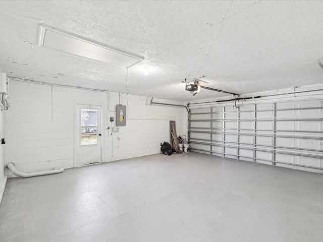 8304 Fishhawk Ave, New Port Richey, FL 34653 - garage featuring a garage door opener and electric panel
