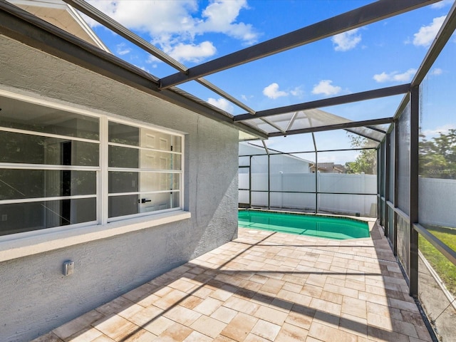 8304 Fishhawk Ave, New Port Richey, FL 34653 - view of patio with a fenced in pool and a lanai