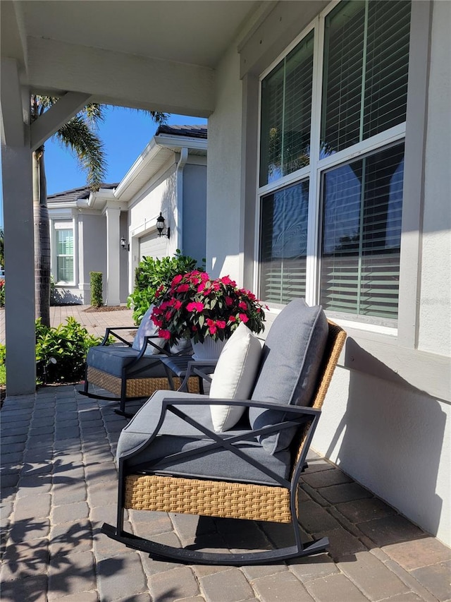 26017 Seastone Dr, Englewood, FL 34223 - porch with an attached garage