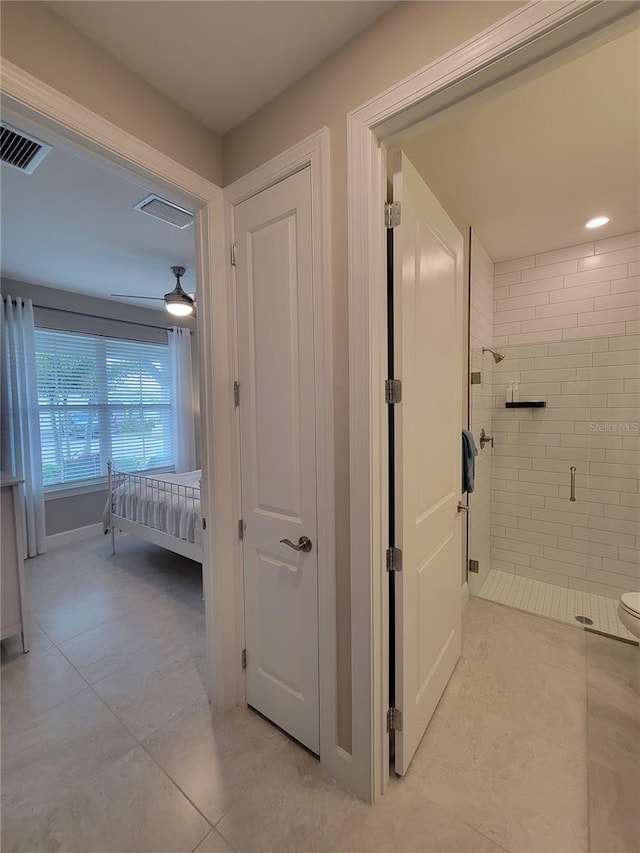 26017 Seastone Dr, Englewood, FL 34223 - hallway featuring light tile patterned floors
