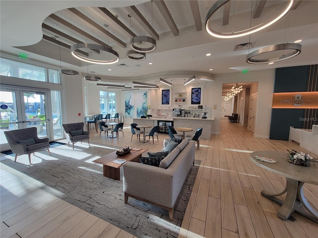 26017 Seastone Dr, Englewood, FL 34223 - common area featuring recessed lighting and beamed ceiling