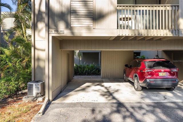 entrance to property featuring central AC and a balcony