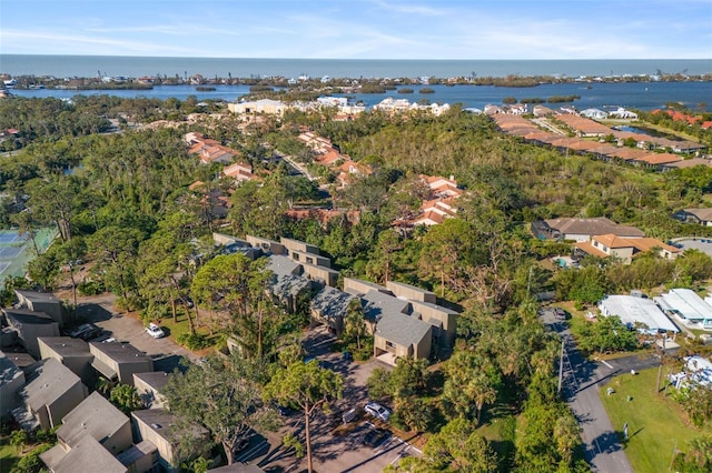 birds eye view of property featuring a water view and a residential view