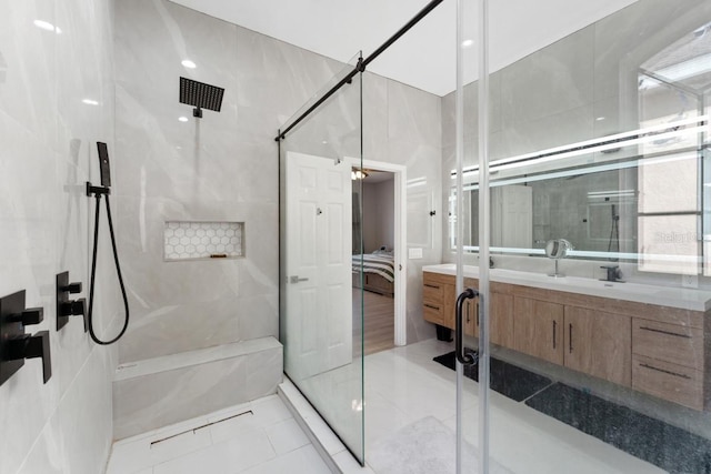ensuite bathroom with vanity, a stall shower, and ensuite bath