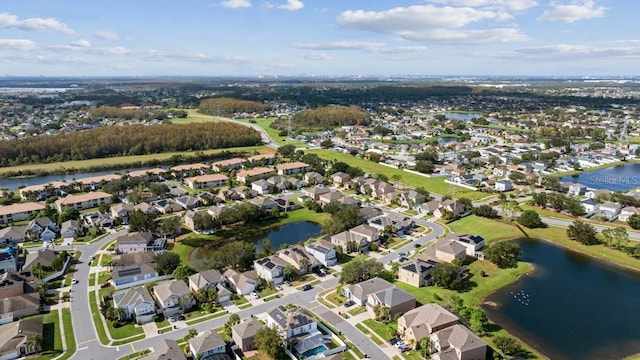 aerial view with a water view and a residential view
