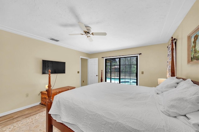 bedroom with ceiling fan, light wood-style floors, access to exterior, baseboards, and visible vents