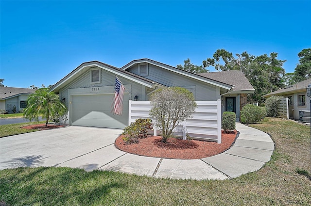 7817 Pine Trace Dr Unit 15, Sarasota, FL 34243 - ranch-style home with an attached garage and concrete driveway