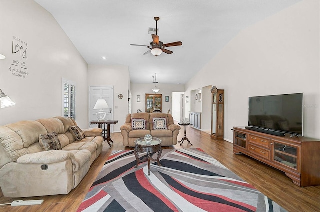 7817 Pine Trace Dr Unit 15, Sarasota, FL 34243 - living area with ceiling fan, wood finished floors, and high vaulted ceiling