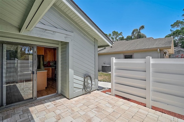 7817 Pine Trace Dr Unit 15, Sarasota, FL 34243 - view of patio with central AC unit