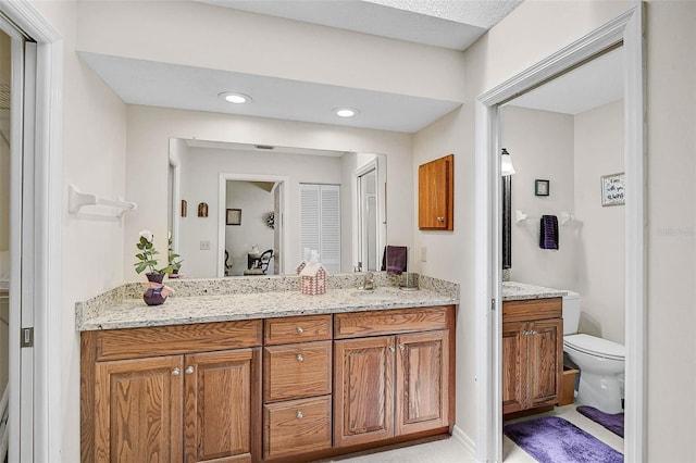 7817 Pine Trace Dr Unit 15, Sarasota, FL 34243 - full bath featuring vanity, recessed lighting, a closet, and toilet
