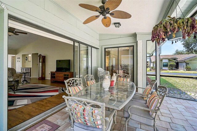 7817 Pine Trace Dr Unit 15, Sarasota, FL 34243 - sunroom / solarium featuring lofted ceiling