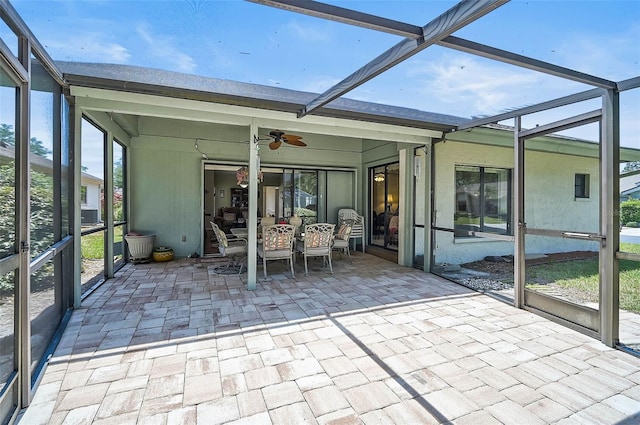 7817 Pine Trace Dr Unit 15, Sarasota, FL 34243 - sunroom / solarium with a healthy amount of sunlight, ceiling fan, and outdoor dining area