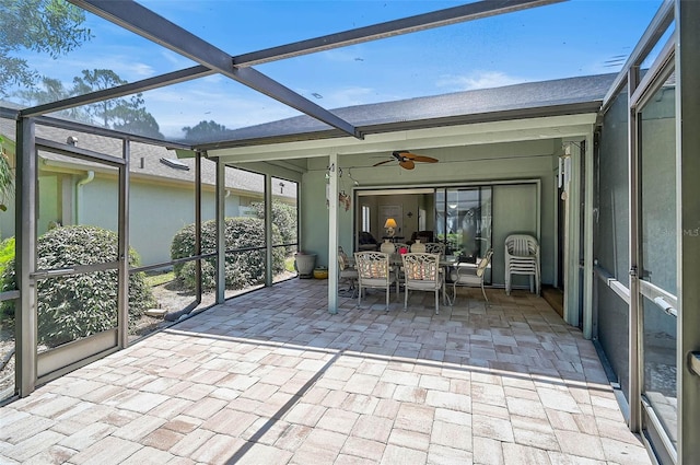 7817 Pine Trace Dr Unit 15, Sarasota, FL 34243 - sunroom featuring outdoor dining space and ceiling fan