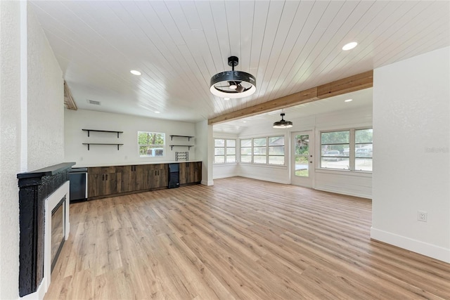 1016 38th St W, Bradenton, FL 34205 - unfurnished living room featuring recessed lighting, baseboards, wood ceiling, and light wood finished floors