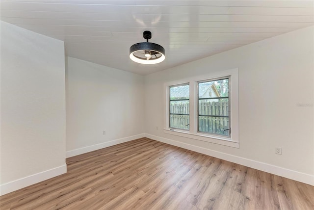 1016 38th St W, Bradenton, FL 34205 - unfurnished room with light wood-type flooring and baseboards
