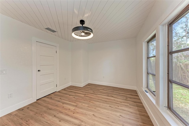 1016 38th St W, Bradenton, FL 34205 - spare room featuring baseboards, visible vents, a healthy amount of sunlight, and light wood-type flooring