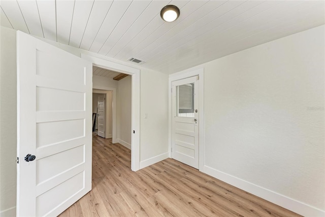 1016 38th St W, Bradenton, FL 34205 - unfurnished room featuring baseboards, light wood-style floors, visible vents, and wooden ceiling