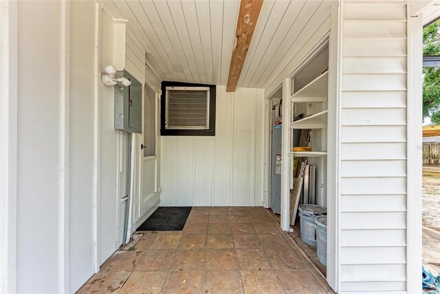 1016 38th St W, Bradenton, FL 34205 - property entrance with electric water heater and electric panel