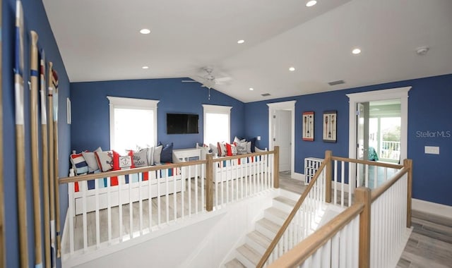 bedroom with wood finished floors, lofted ceiling, baseboards, recessed lighting, and ceiling fan