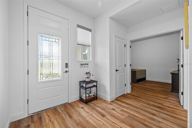 11430 Gallatin Trl, Parrish, FL 34219 - entryway with light wood-style flooring and baseboards