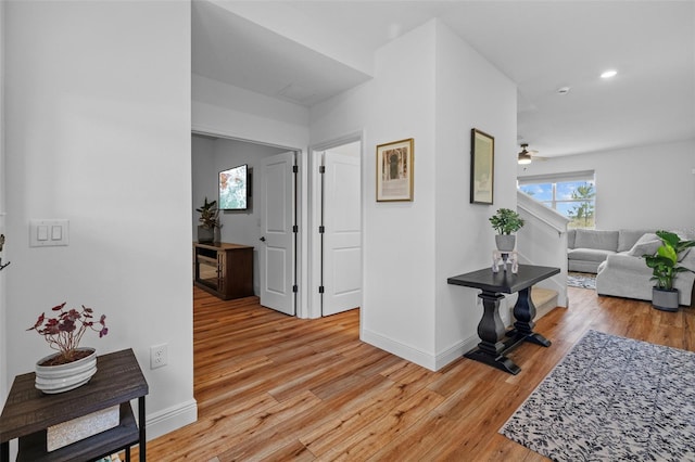 11430 Gallatin Trl, Parrish, FL 34219 - hallway with light wood-style floors, baseboards, and recessed lighting