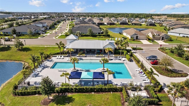 11430 Gallatin Trl, Parrish, FL 34219 - aerial perspective of suburban area featuring a pool and a large body of water