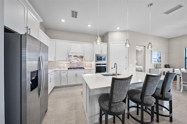 6244 Talon Preserve Dr, Nokomis, FL 34275 - kitchen featuring a sink, tasteful backsplash, stainless steel appliances, and visible vents