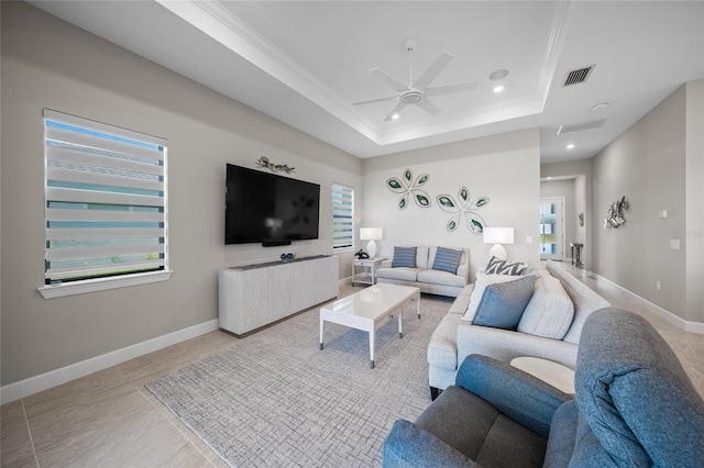 6244 Talon Preserve Dr, Nokomis, FL 34275 - living room with crown molding, a ceiling fan, visible vents, and a healthy amount of sunlight