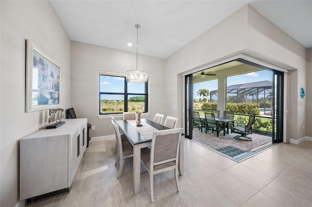6244 Talon Preserve Dr, Nokomis, FL 34275 - dining area with baseboards, recessed lighting, light tile patterned floors, and a chandelier