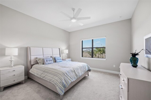 6244 Talon Preserve Dr, Nokomis, FL 34275 - bedroom featuring baseboards, light carpet, and ceiling fan