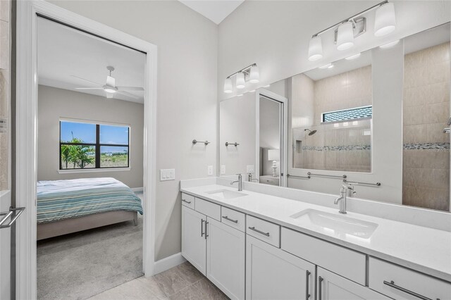 6244 Talon Preserve Dr, Nokomis, FL 34275 - bathroom featuring a sink, a walk in shower, baseboards, and connected bathroom