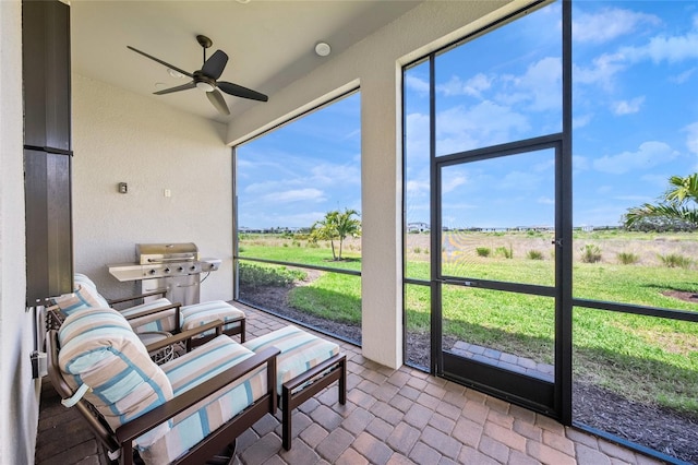 6244 Talon Preserve Dr, Nokomis, FL 34275 - sunroom / solarium with a ceiling fan and a healthy amount of sunlight
